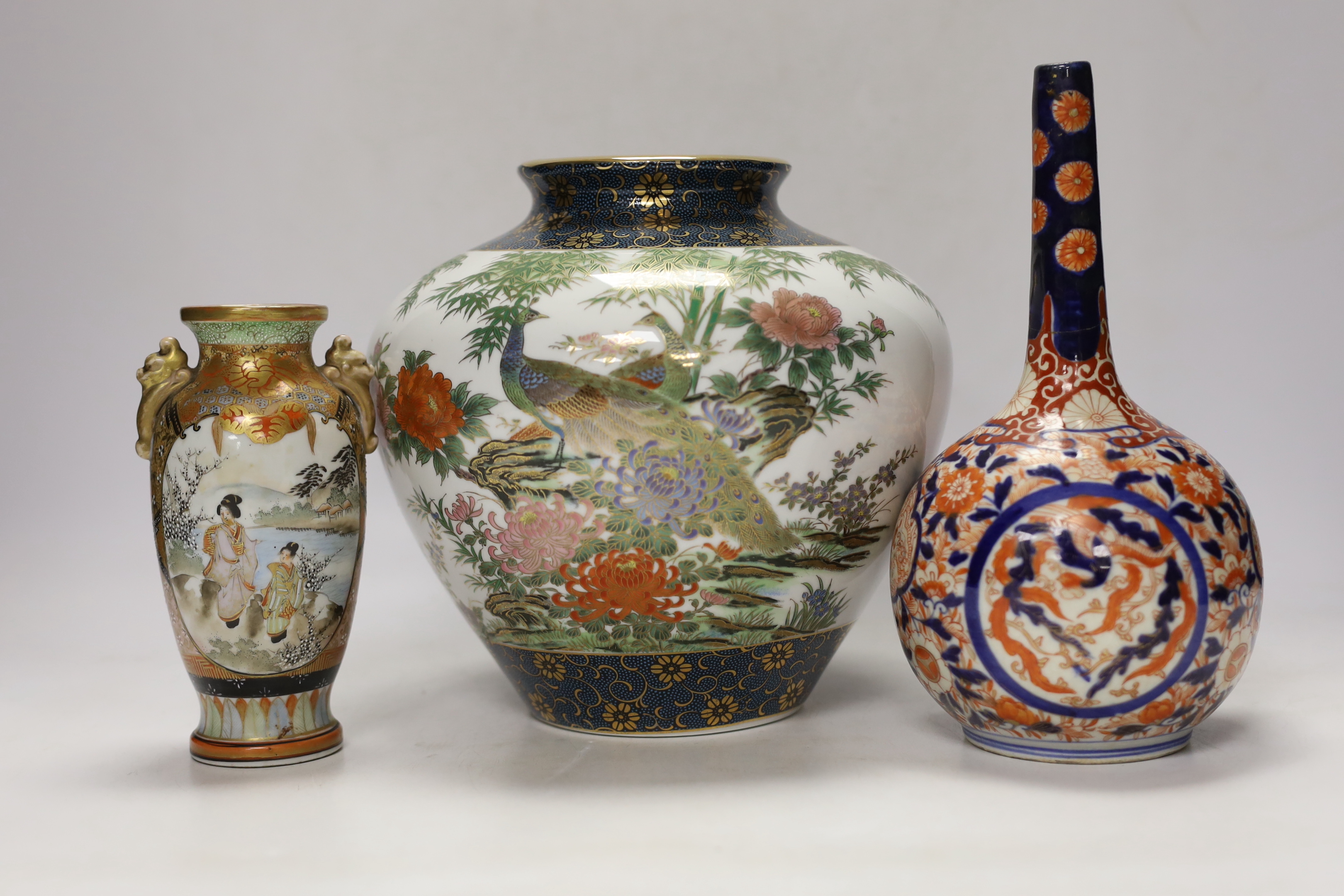 Japanese ceramics including an Imari bottle vase, a Satsuma vase and Kutani eggshell porcelain, tallest 22cm (8)